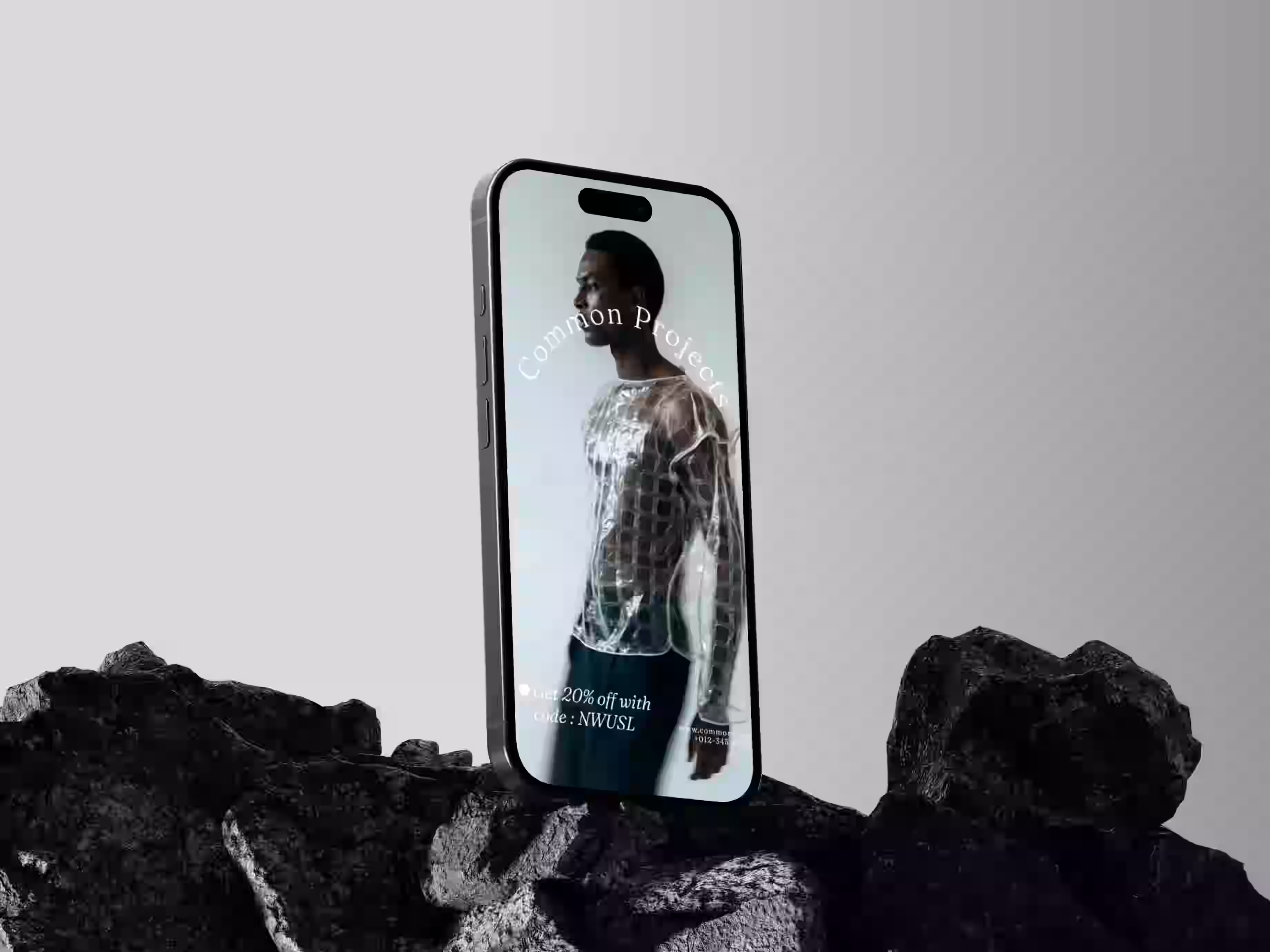 Mobile UI design for fashion e-commerce startup – sleek product showcase on iPhone screen.