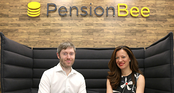 Jonathan and Romi sat in front of the PensionBee logo