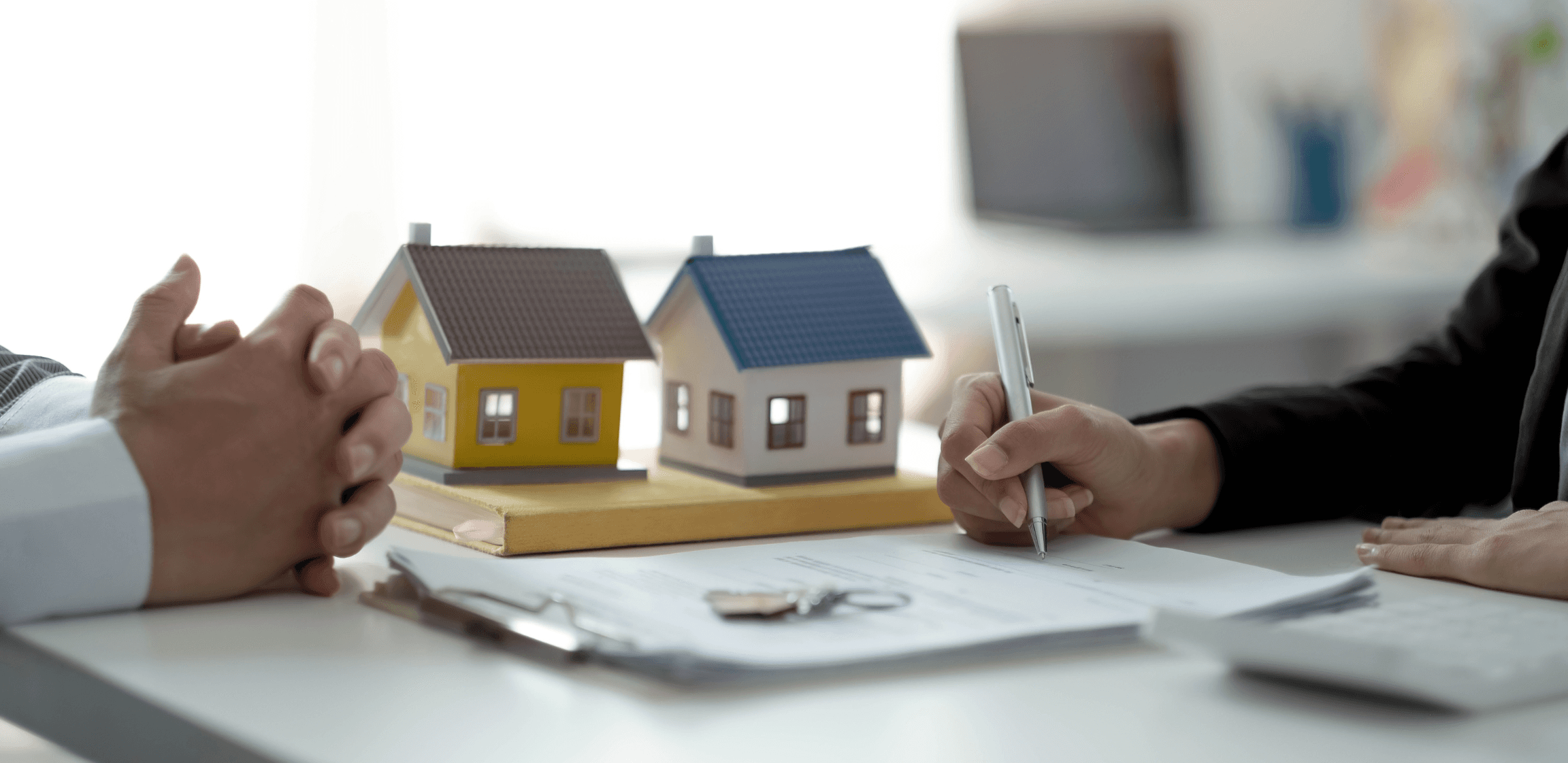 Signing real estate property purchase documents - NOI Real Estate