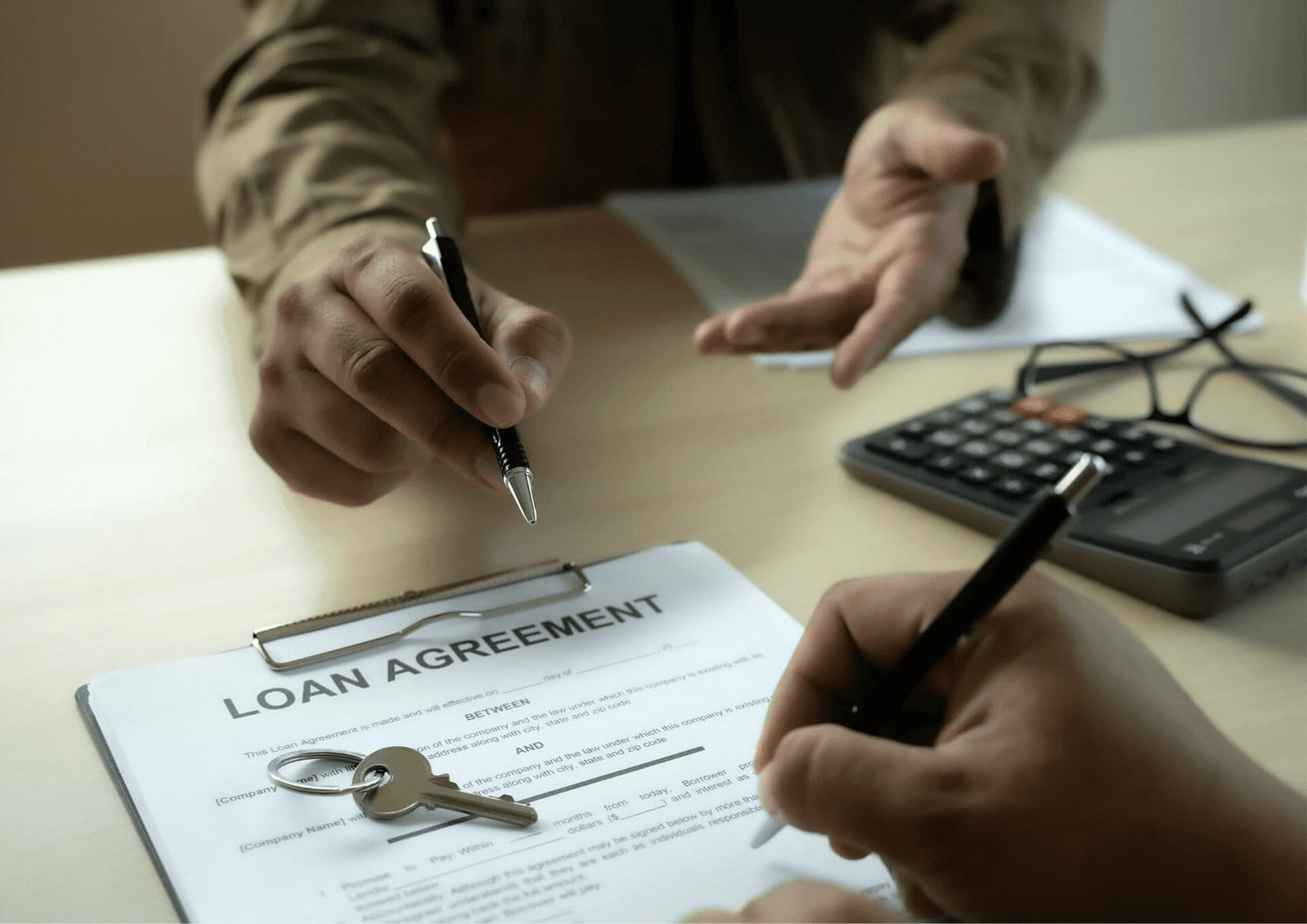 Signing a formal property loan agreement - Commercial Real Estate Loan Requirements