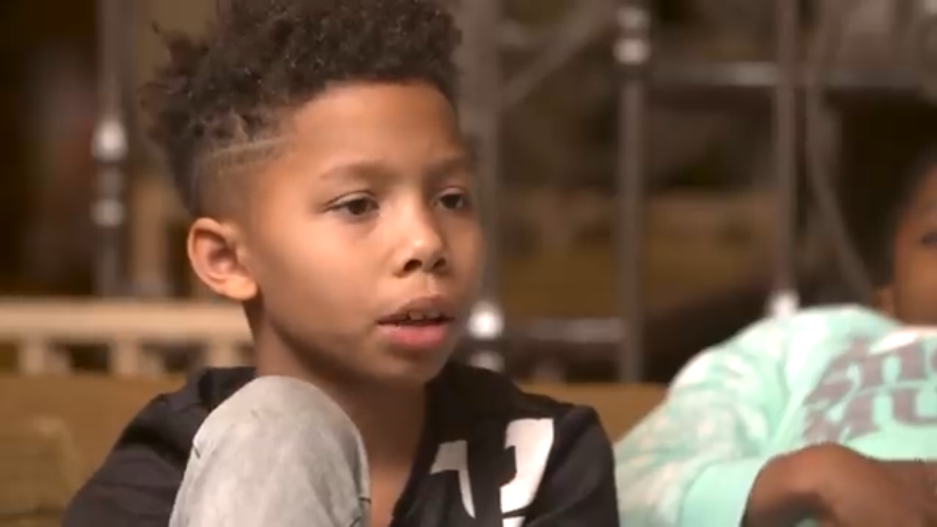 Transgender child talks with an interviewer about their experience