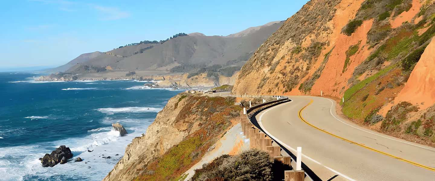 Coastal road view along cliffs in California.