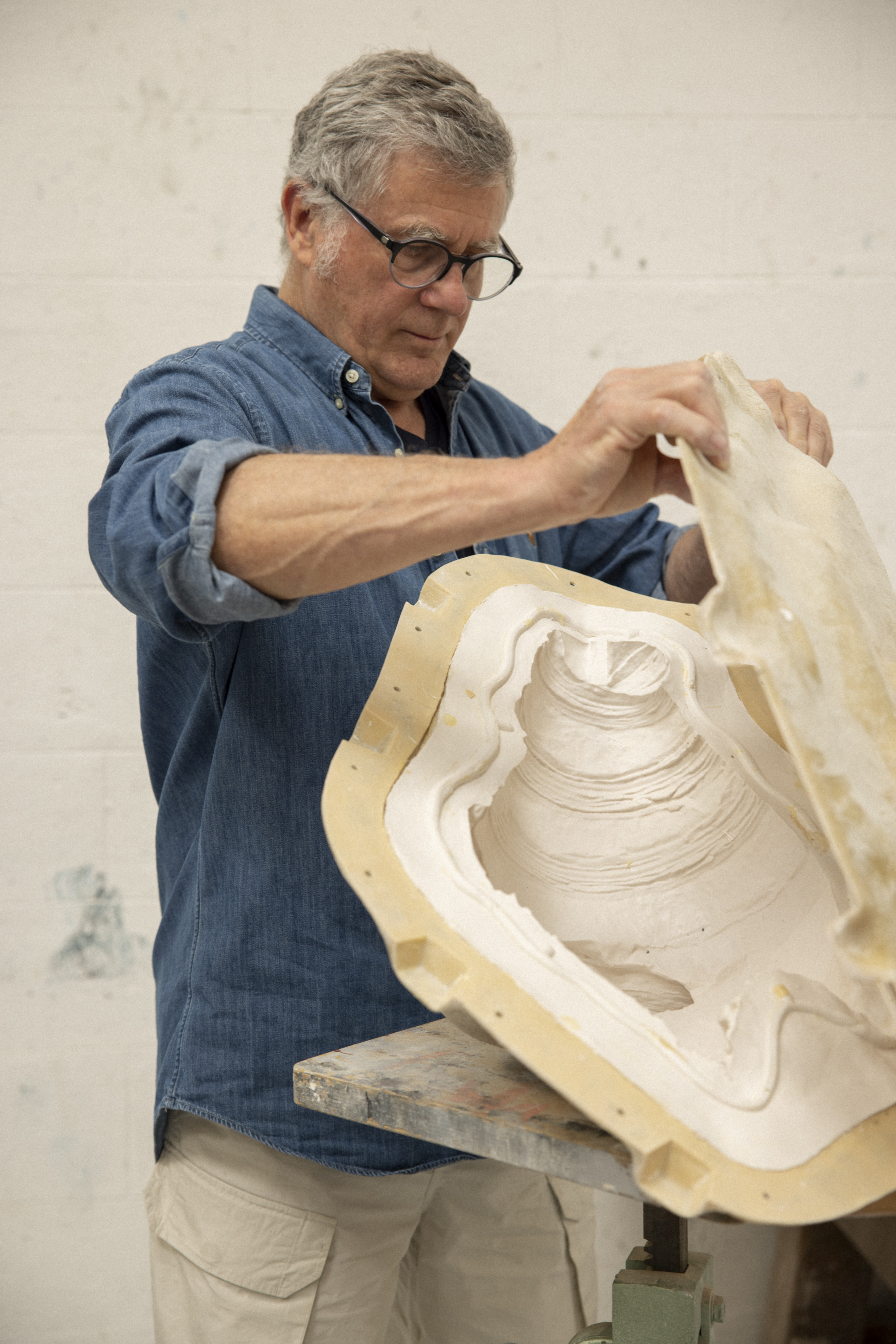 Eric Saint Chaffray, sculptor for 35 years at Musée Grévin sculpting the the Parisian workshop a new contemporary centerpiece, the Croissant.