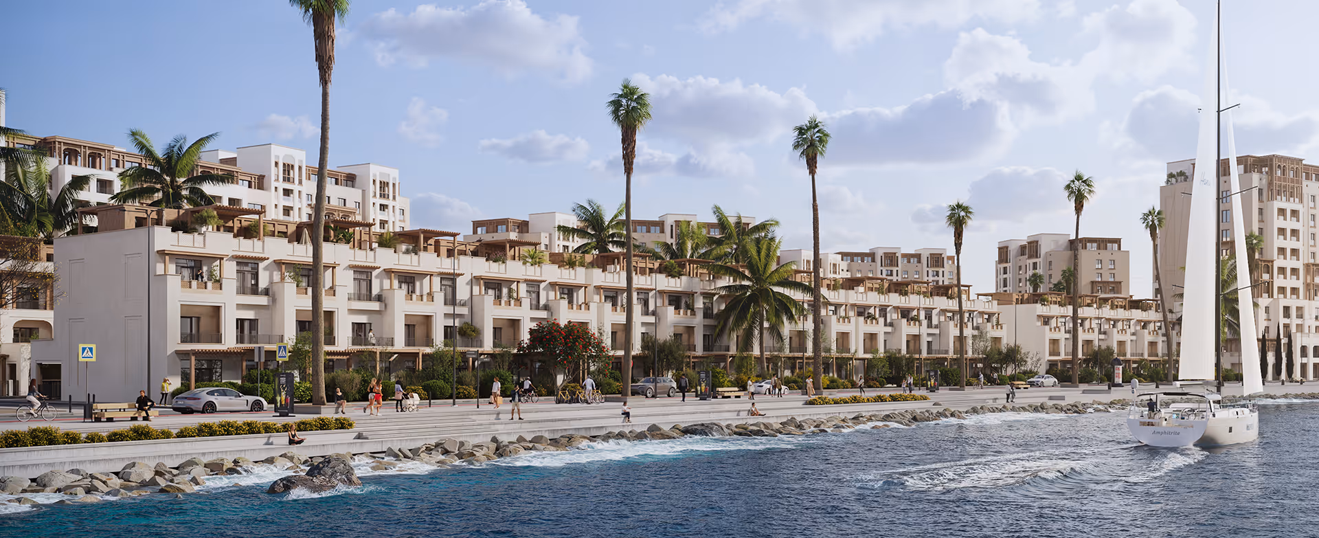 A boat traveling down a river next to tall arabian ranches buildings.