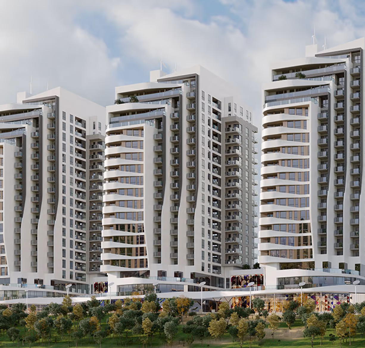 A group of tall white buildings sitting next to each other  - Sabah Residence