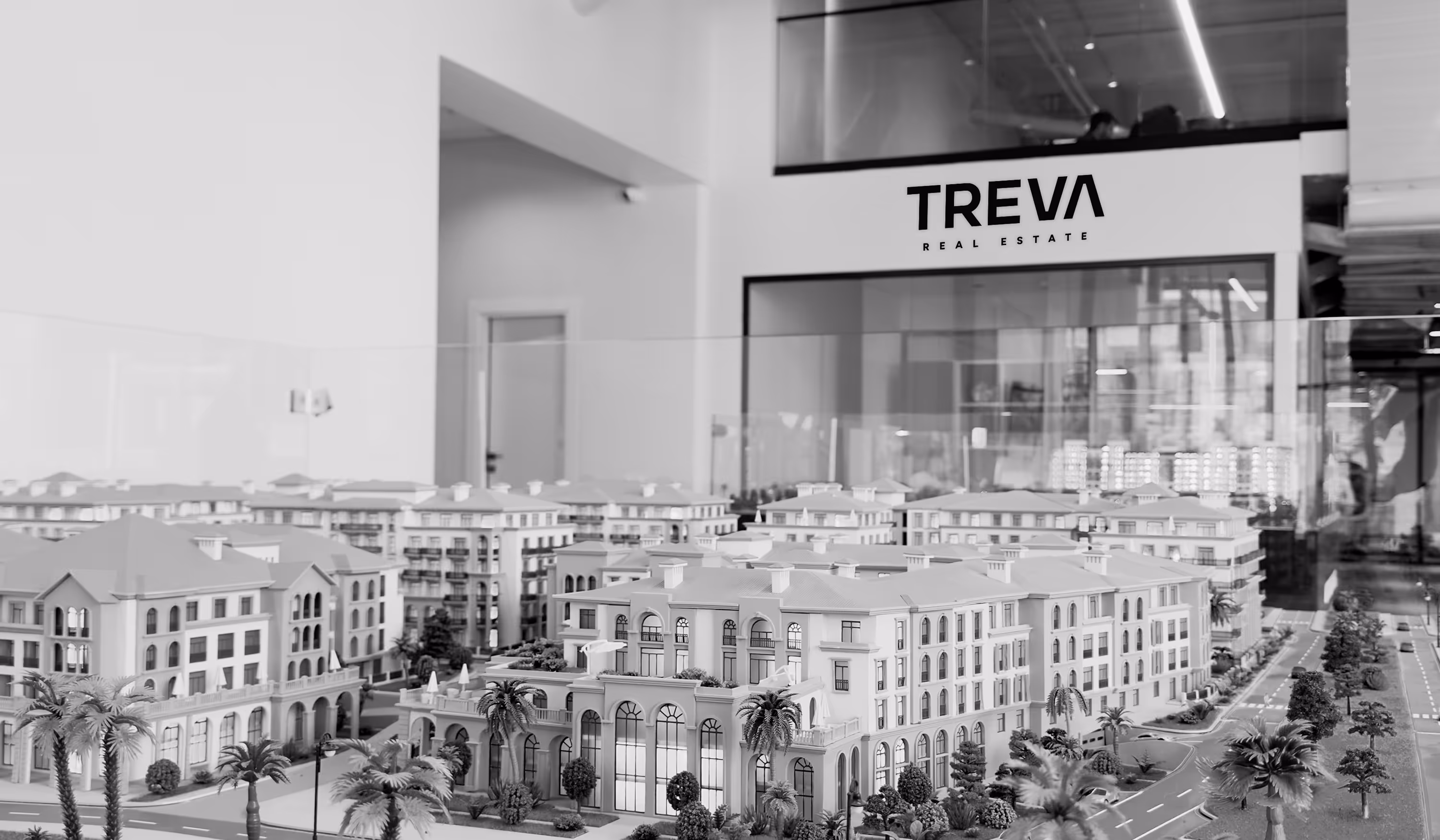 A black and white photo of a model of a city.