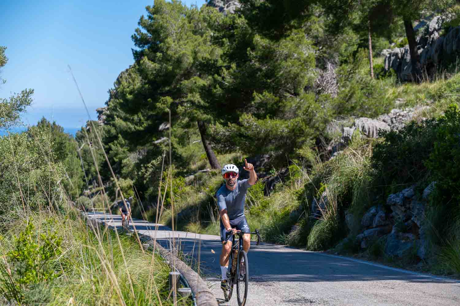 Cyclist finger in the air