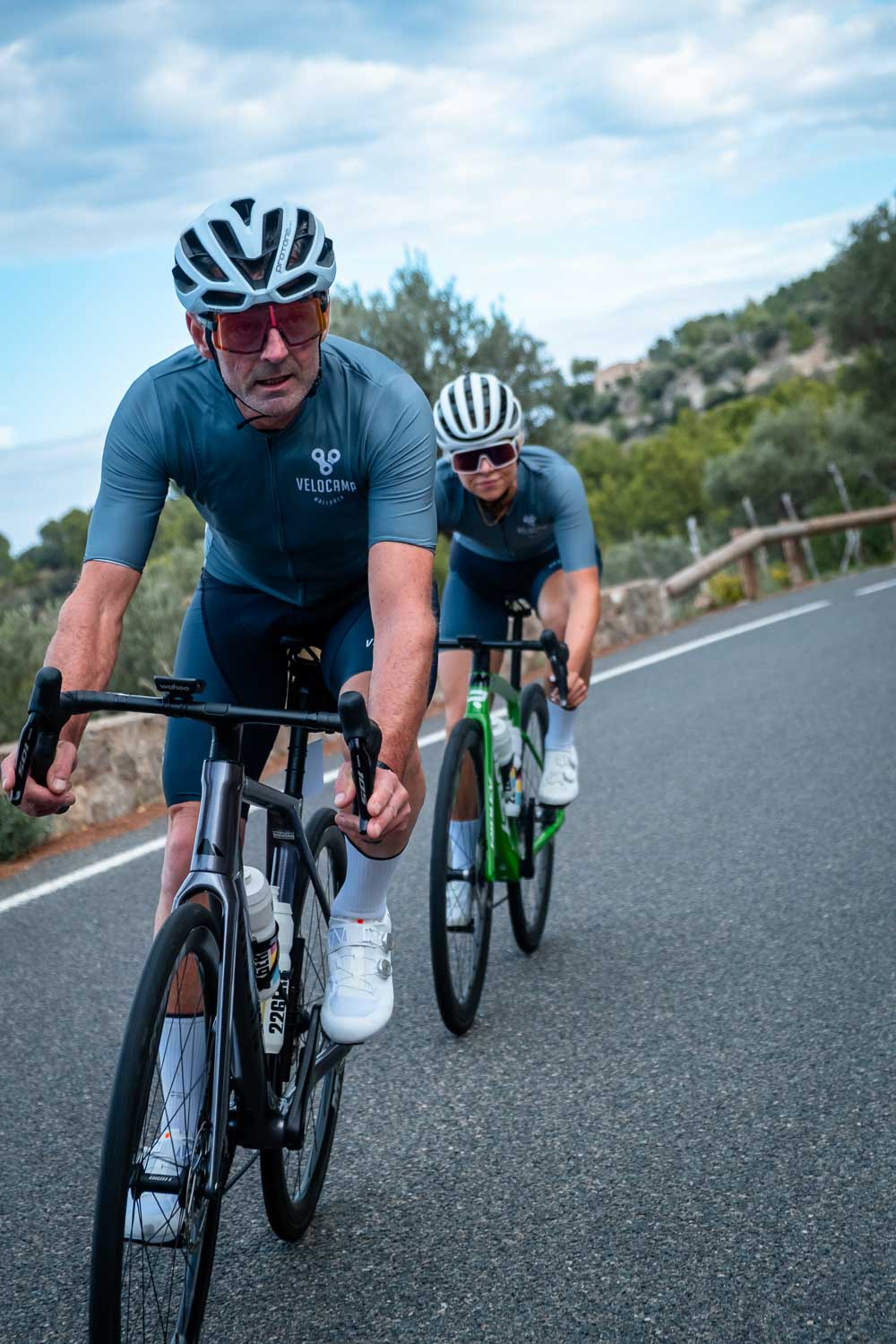 Two cyclists sprinting