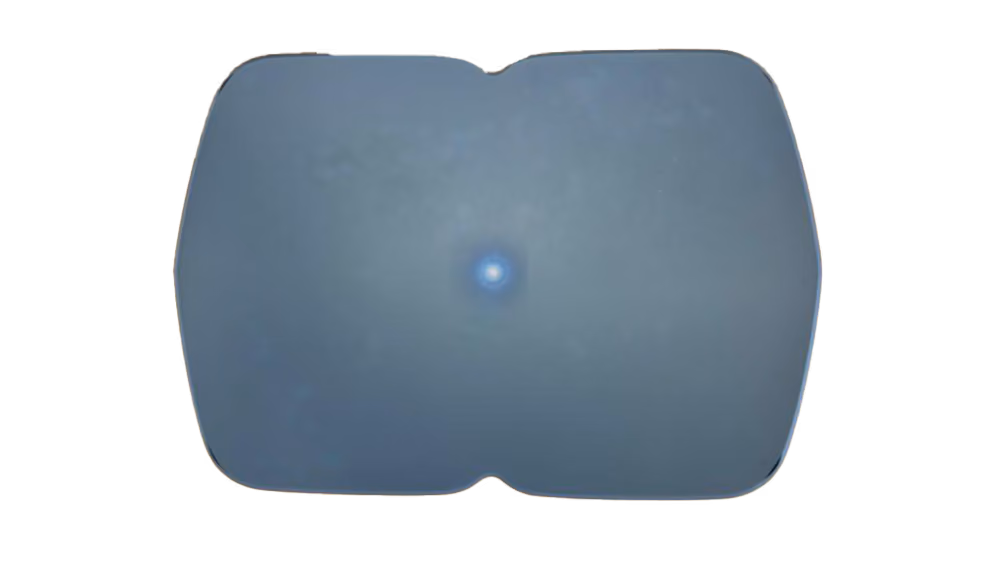Blue-tinted rectangular lens with rounded corners and a small circular highlight in the center.