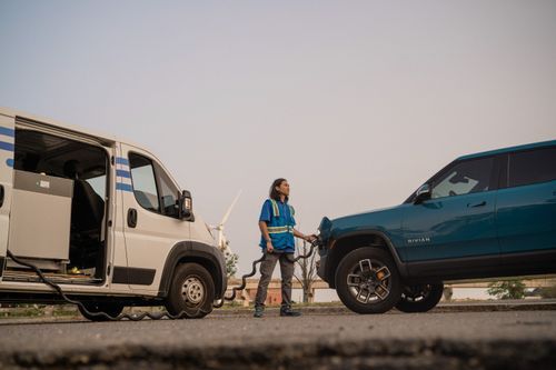 SparkCharge mobile EV charging technician providing battery powered DCFC (Level 3 EV Charging) to a Rivian R1T