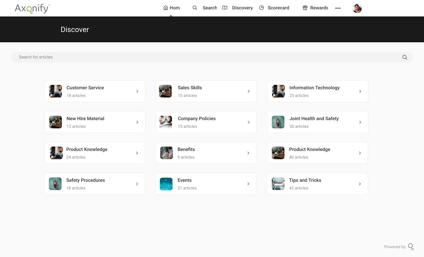 Axonify learning management system discovery page showing categories like Customer Service, Sales Skills, Information Technology, and New Hire Material.