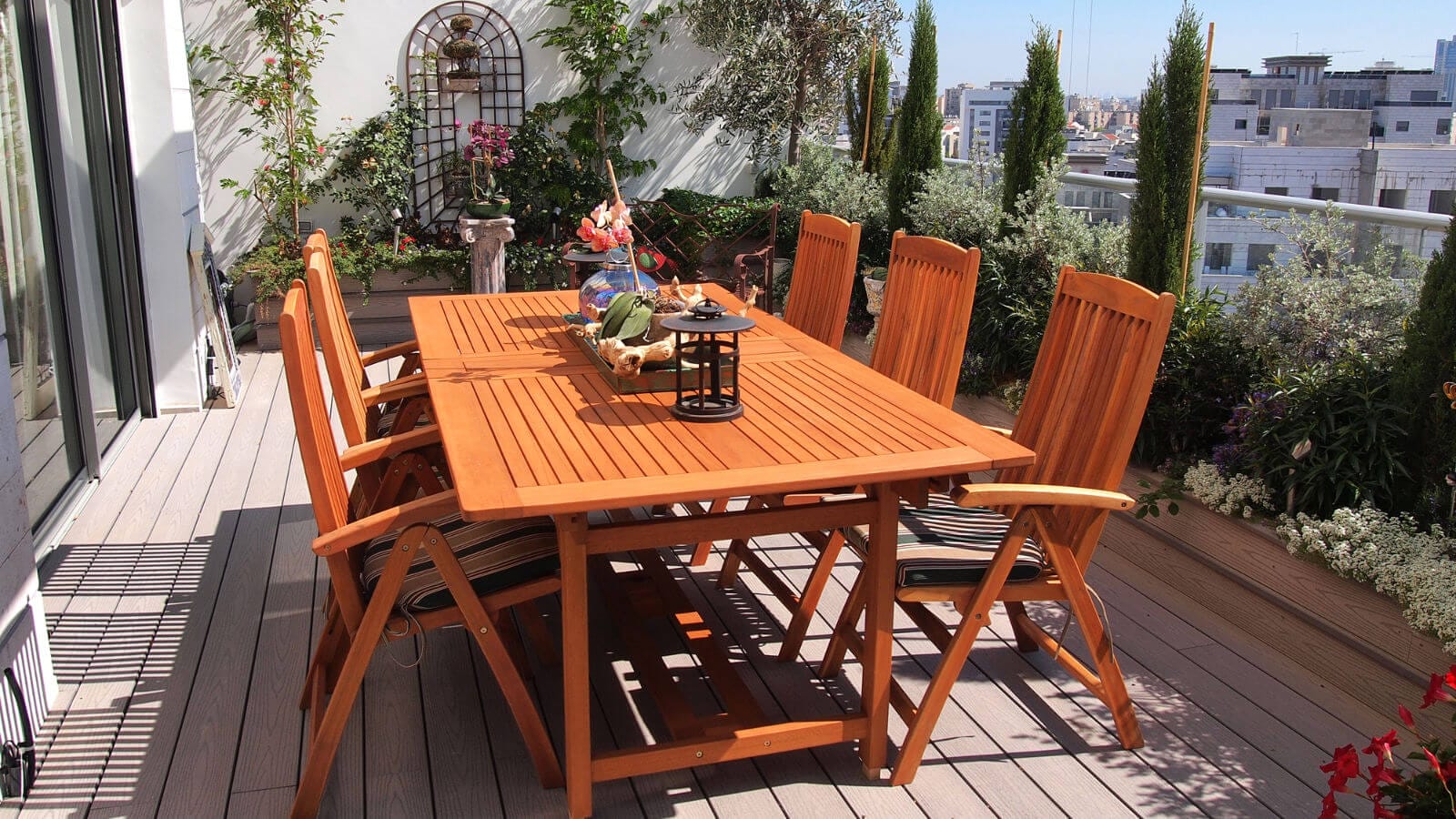 An eye-catching rooftop deck, exemplifying one of the many deck styles available for creating a personalized and stylish outdoor space to relax and entertain