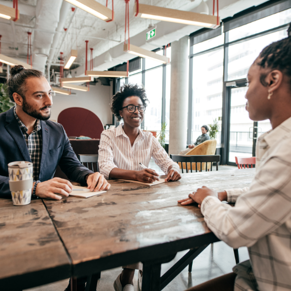 Hiring team discussing candidate outcomes