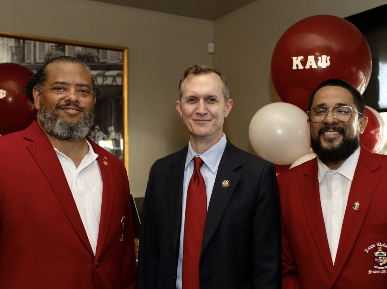 LPAC members with a community partner at a chapter event