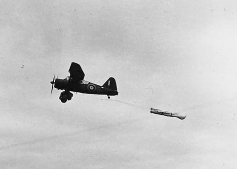 A Lysander moments after deploying the target drogue