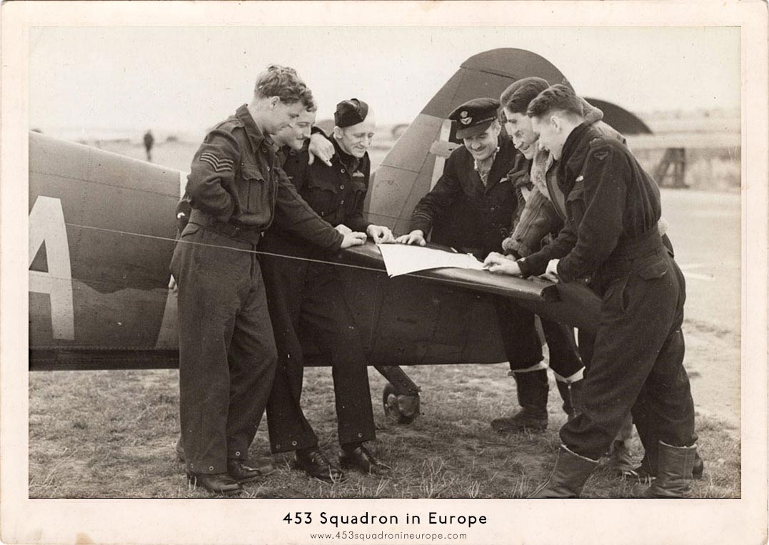 A flight making plansL-R: Unknown (RAF), John Barrien, Wilfred Waldron, Richard Ratten, Bob Clemesha, Jack Stansfield, Rusty Leith