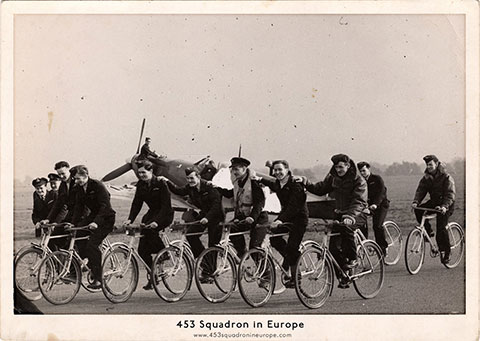 453 Squadron Spitfire pilots riding bicycles in formation