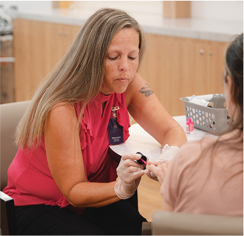 photo of a nurse taking care of someone