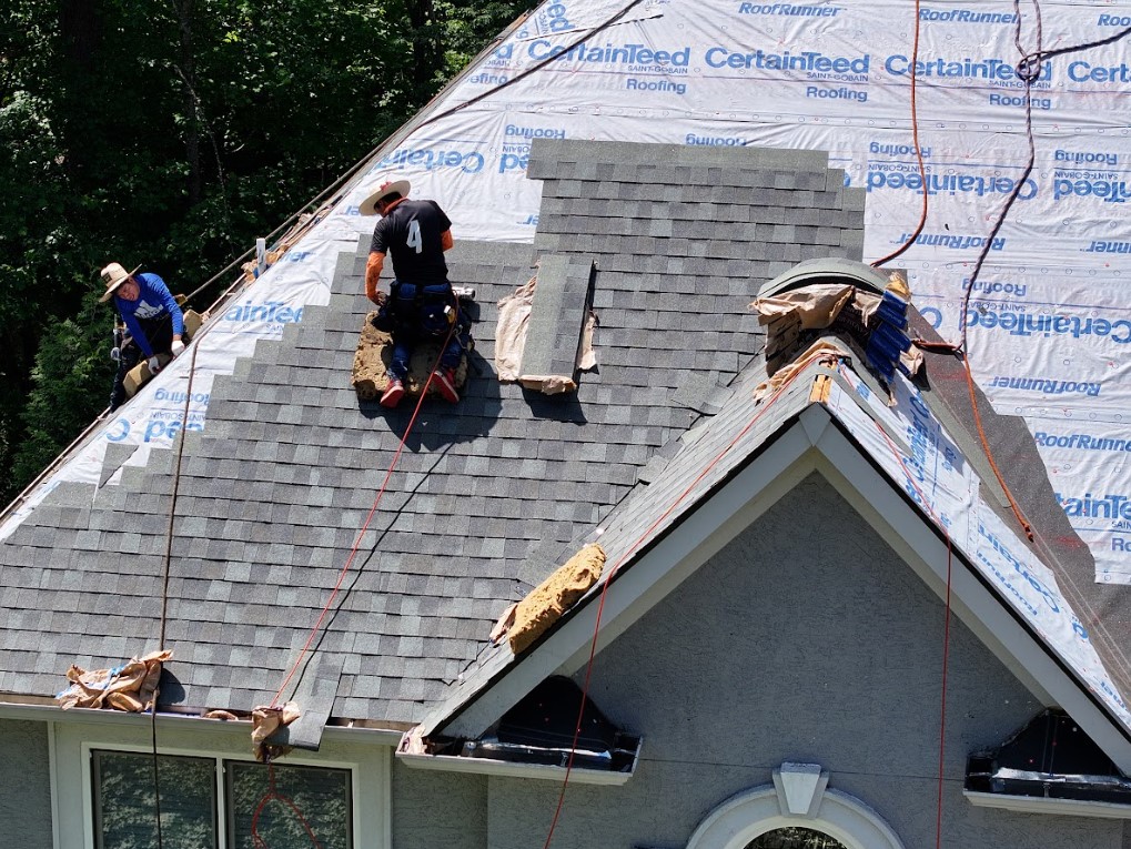 replace roof after hail damage in Cumming, GA