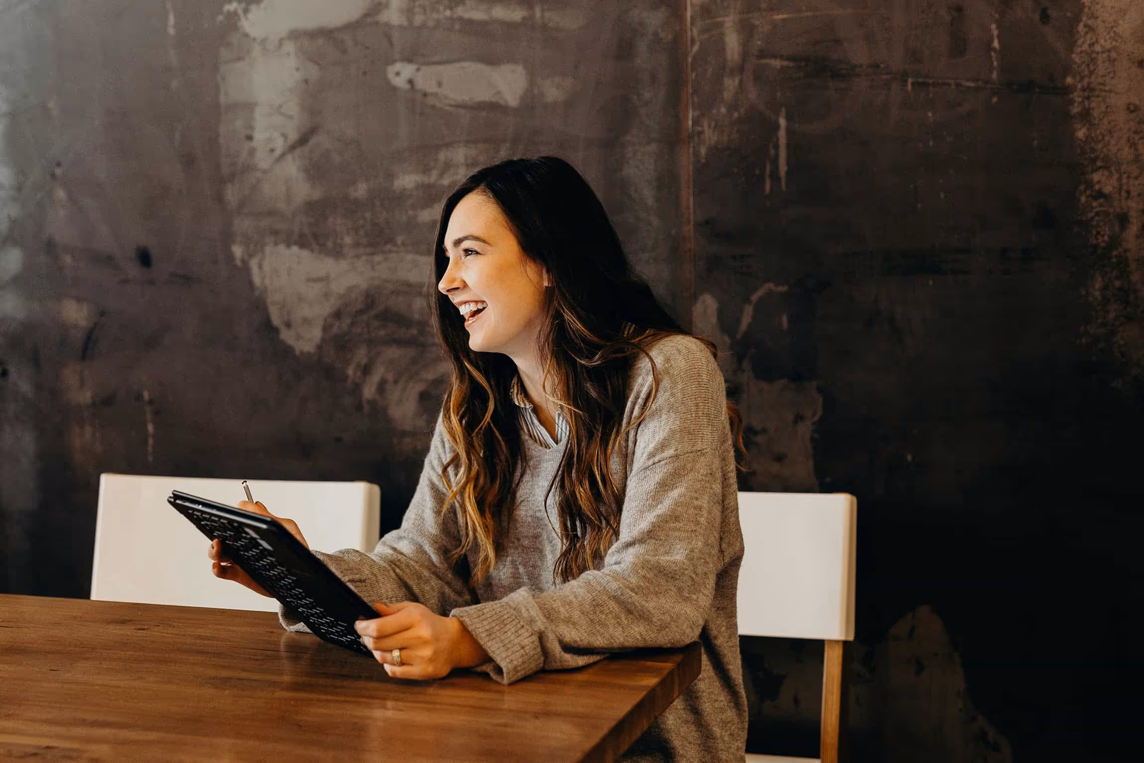Lady holding an iPad 