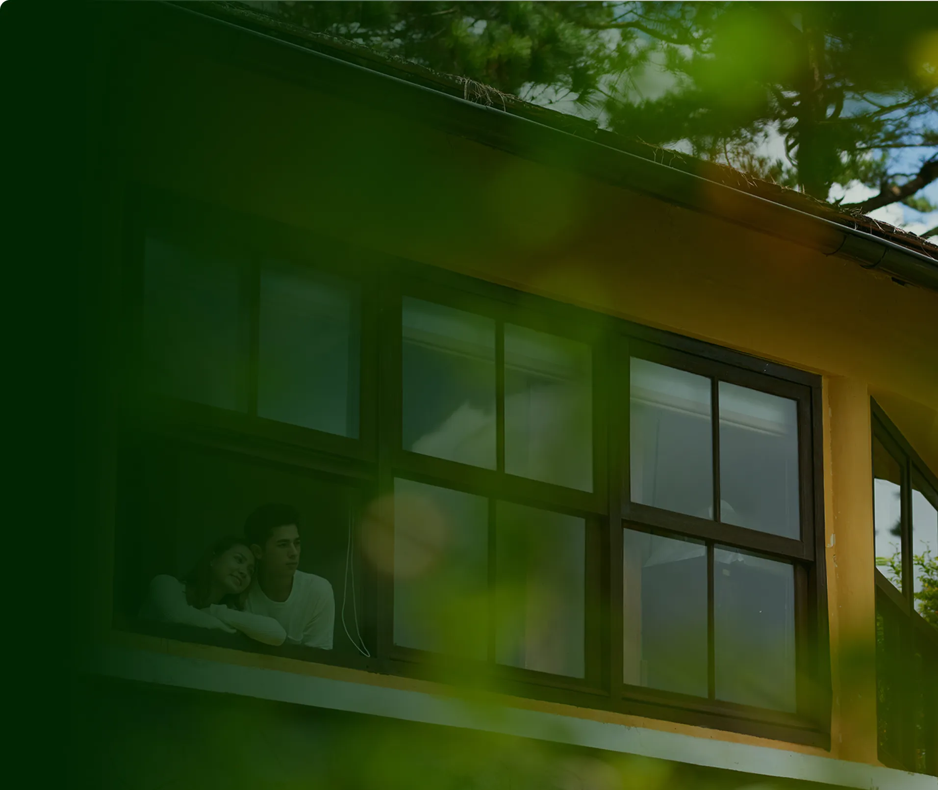 Couple talking on a building window