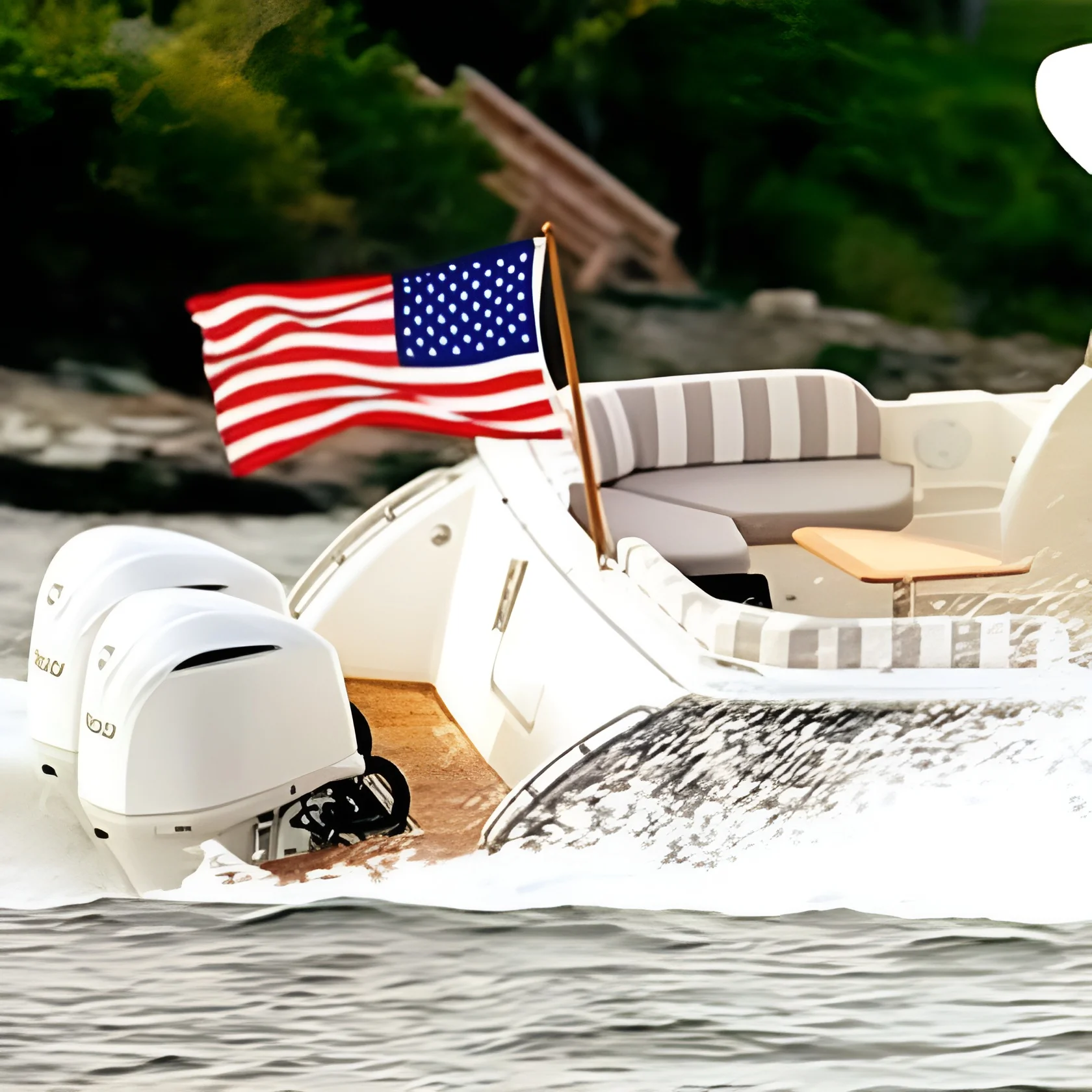Back view of a luxury boat with striped custom marine upholstery and soft furnishings by Alfred’s by Sea, highlighting premium yacht interiors and American craftsmanship.