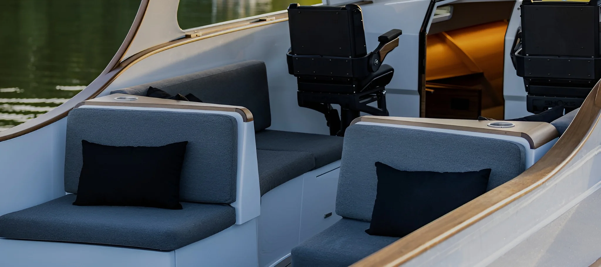 Modern yacht seating with custom marine upholstery and clean finishes by Alfred’s Maine, inviting commissions through refined craftsmanship and personalized design.