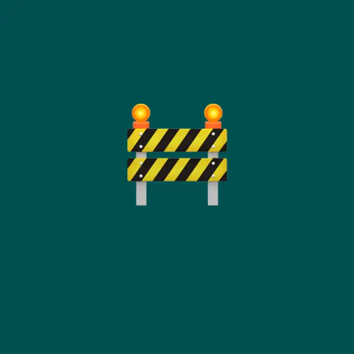 Schwarz-gelbe Baustellenabsperrung mit zwei orangefarbenen Warnlichtern auf grünem Hintergrund.