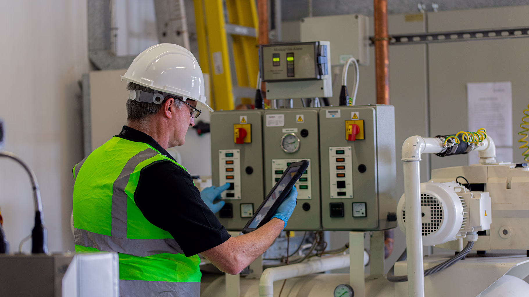 Bellrock construction worker carrying out mechanical and electrical services