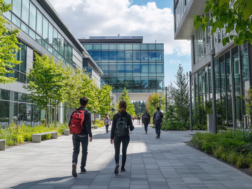condition surveys page. picture of students on modern university campus buildings