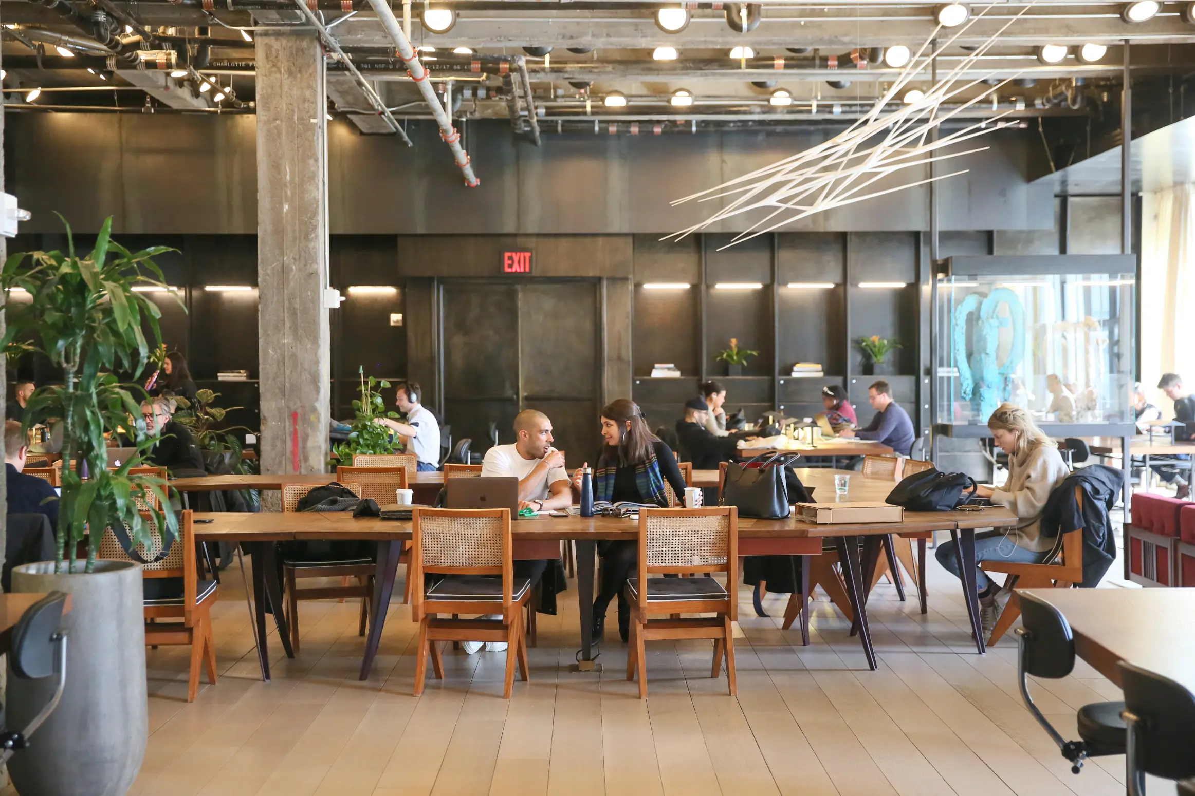 Coworking area at Spring Place with shared desks and creative atmosphere