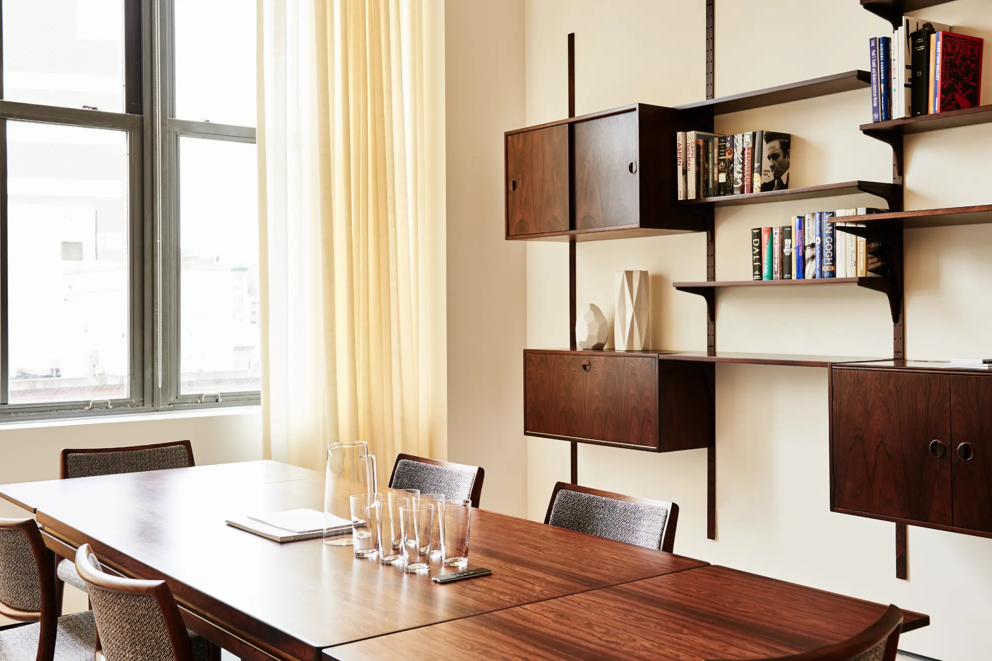 Seminar room at Spring Place with rows of chairs and presentation setup