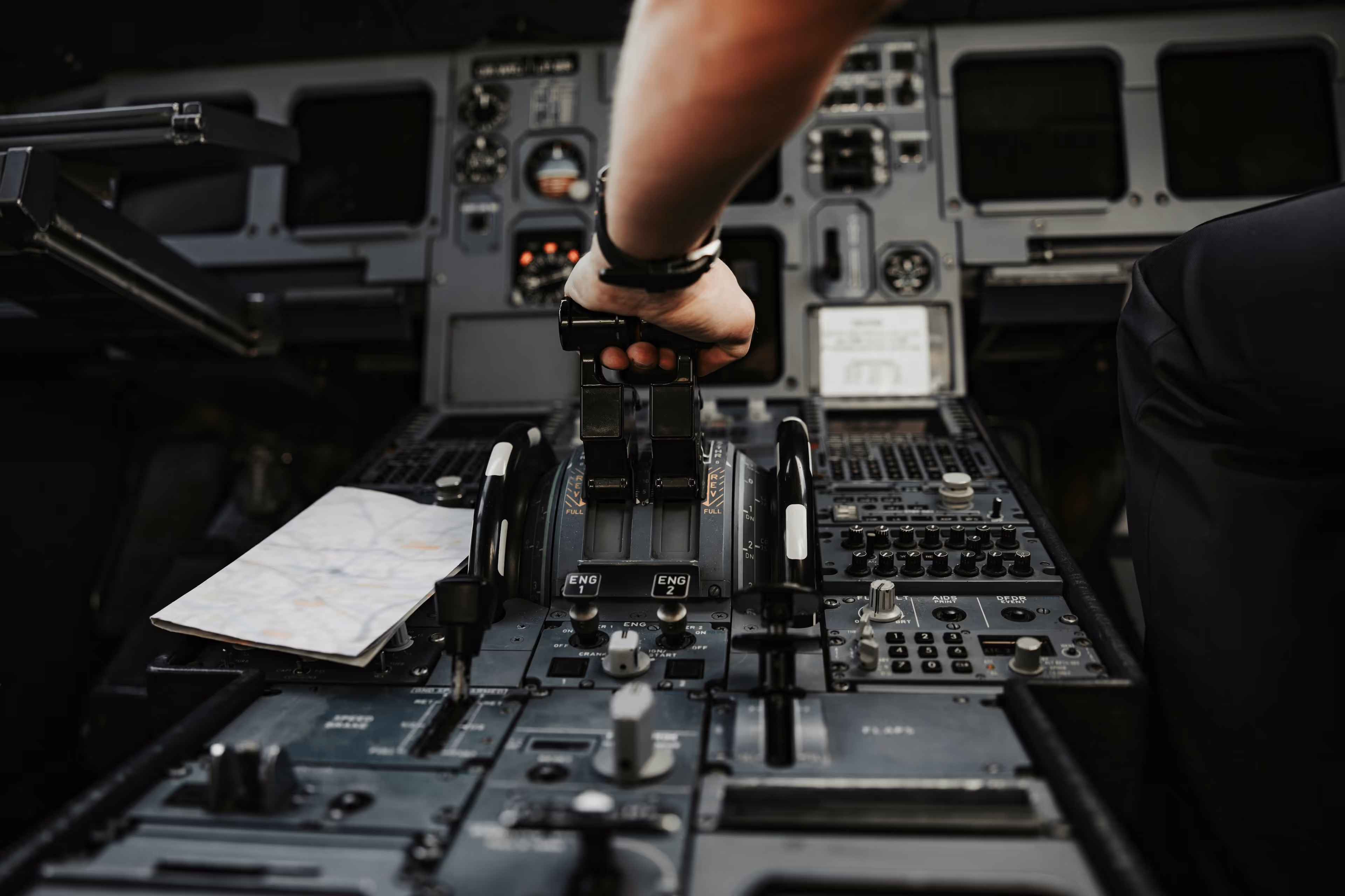 Hand adjusting internal components of avionic equipment.