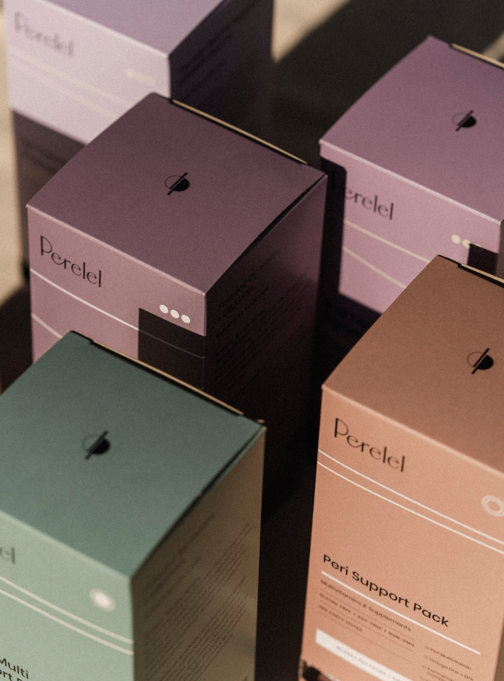 Perelel Health product packaging boxes lined up in rows.
