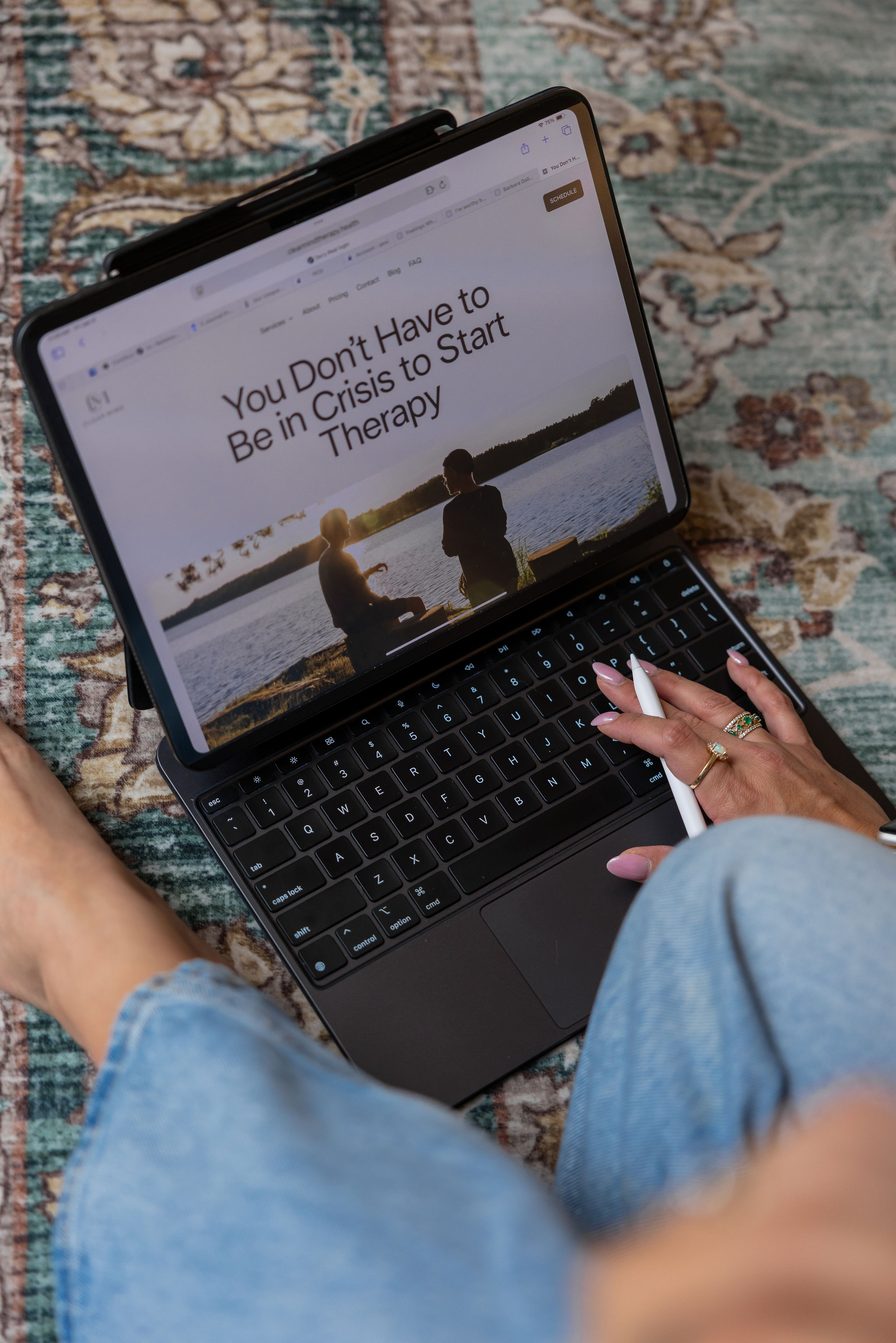 Nathaly Moreno listening while taking notes during session