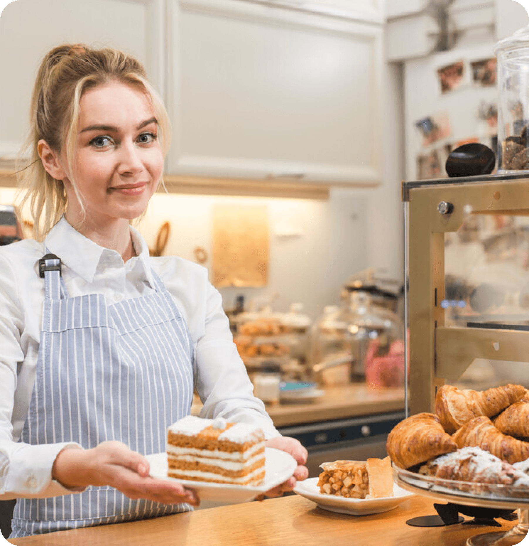 Independent bakery owner serving a customer with Worthify loyalty program driving repeat visits.