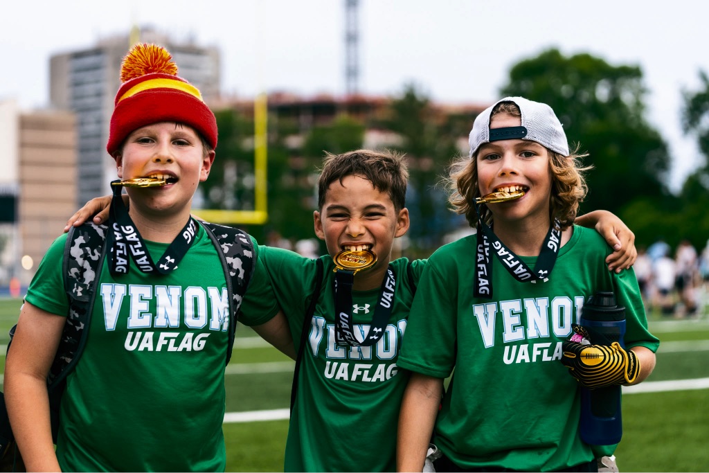 Young flag football players celebrating
