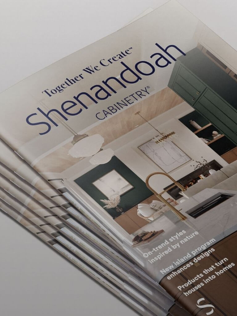 Shenandoah Cabinetry brochure featuring a modern kitchen with green cabinets, a brass faucet, and on-trend nature-inspired designs.
