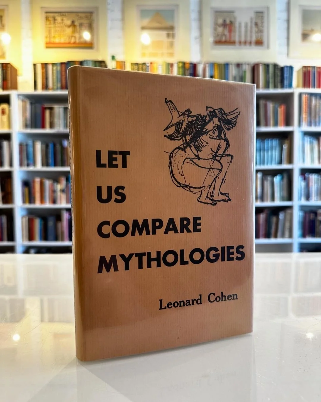 A picture of the Leonard Cohen’s debut 1956 collection Let Us Compare Mythologies first published by McGill Poetry Series and later reissued by McClelland and Stewart
