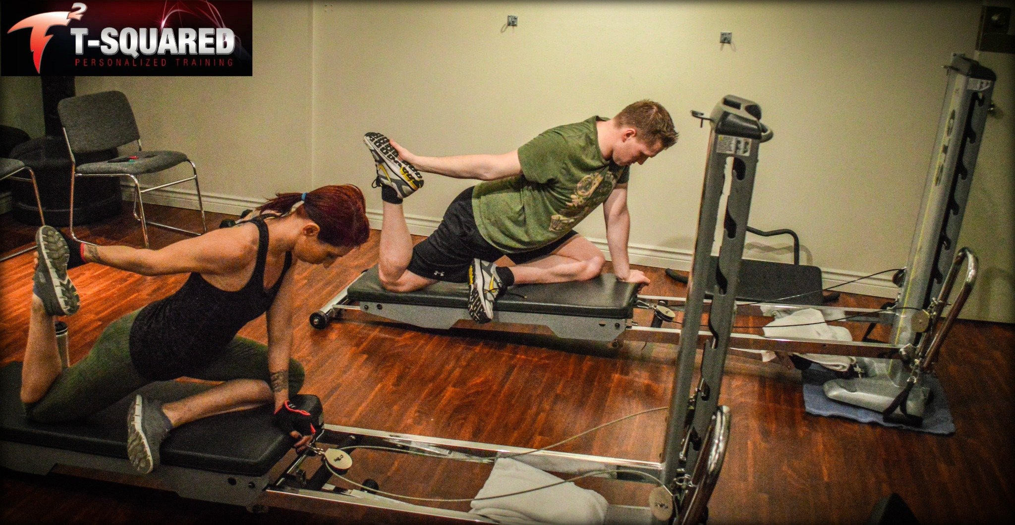 Man and woman over 40 performing rehabilitation exercises with a personal trainer at Tsquared Personal Training in Vancouver, regaining strength and confidence after injury.