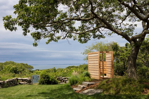 A custom outdoor shower enclosure with water views on Matha's Vineyard