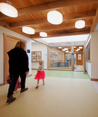 Interior of Martha's Vineyard Community Services Early Childhood Center with an adult and child.