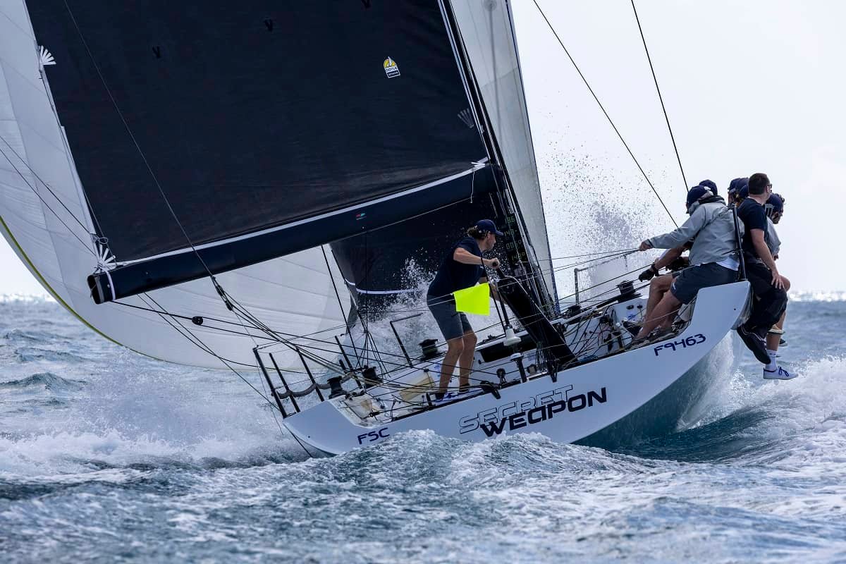 A reminder of Day 1 as Secret Weapon crew hold onto the kite in a big seaway