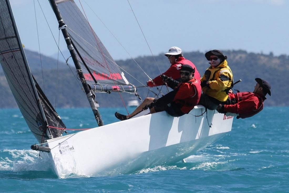 RE-Heat on fire today - Photo: Shirley Wodson|Aerial shot of The Stig - Photo: Shirley Wodson|Derek Sheppard and his Black Sheep - Photo: Shirley Wodson|School's Out has come a long way by water to compete at Airlie Beach Race Week - Photo: Andrea Francolini