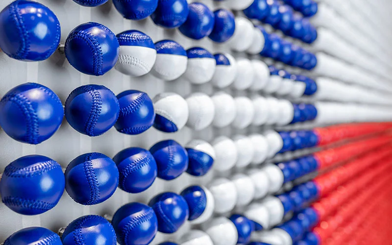Painted baseballs create a depiction of Texas state flag