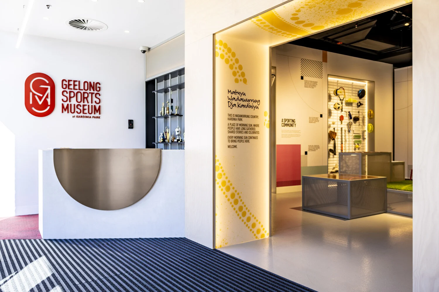 The museum entrance, located on the main stadium concourse, showcases the museum’s bold lozenge-shaped branding. 