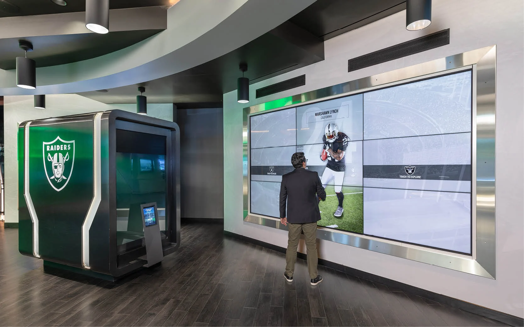 The Raider Nation Interactive Wall provides an immersive and informative experience for visitors. 