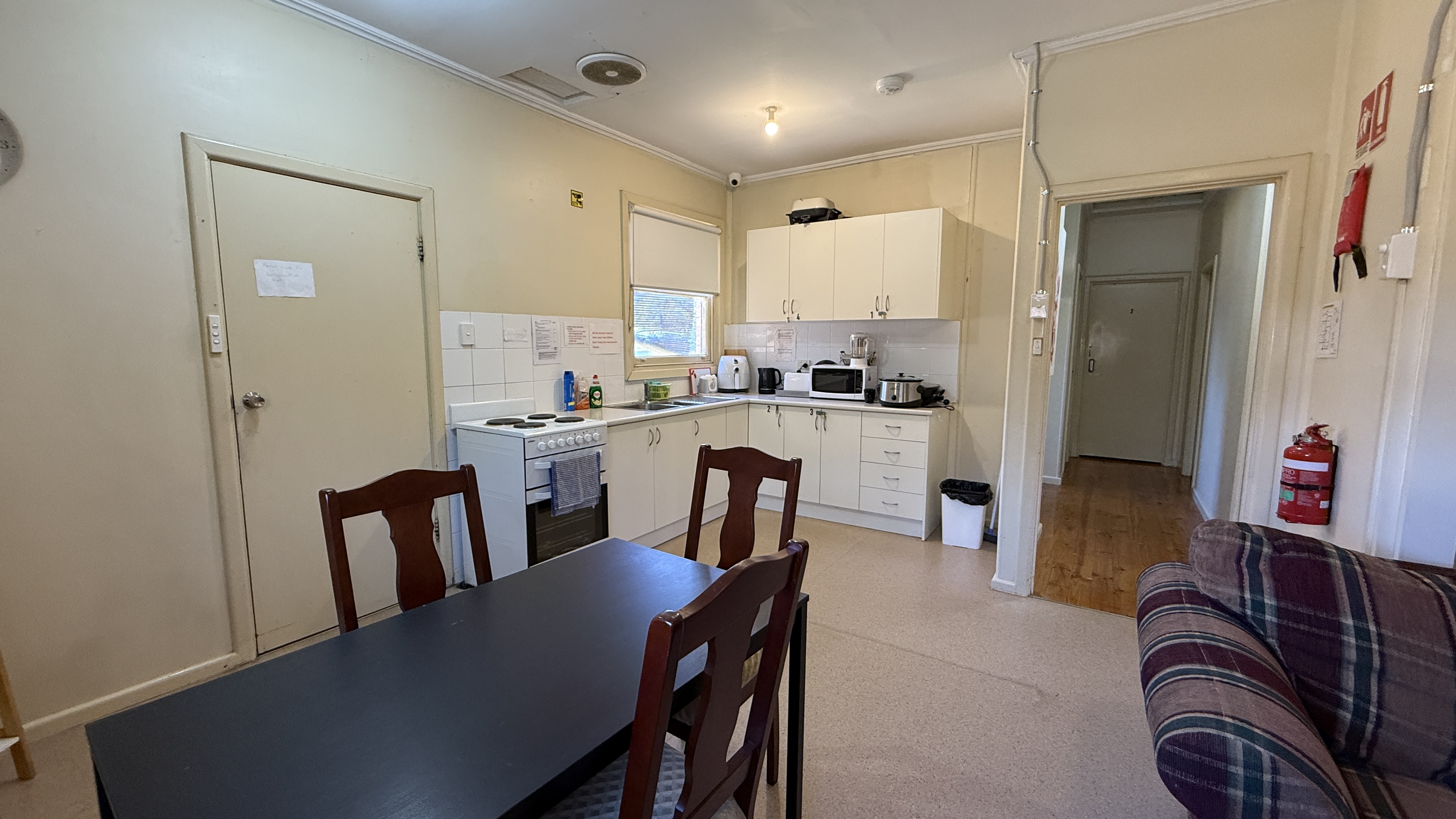 Elizabeth Downs share house Communal dining and kitchen area with furnished lounge shared space