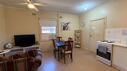 Elizabeth Downs share house Shared lounge and dining area with dining table and kitchen access shared space