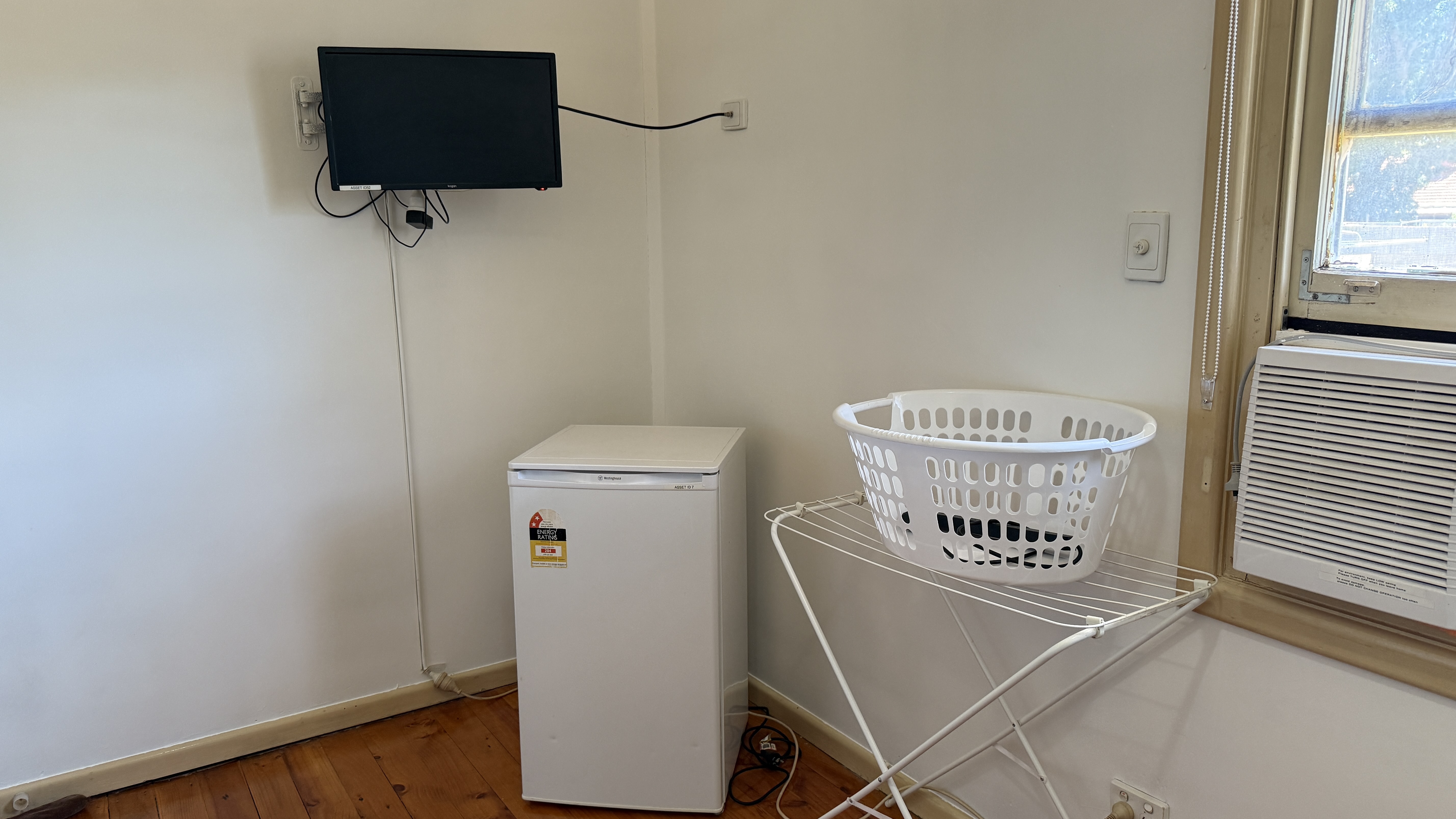 Elizabeth Downs share house Secure private bedroom with wall-mounted TV, bar fridge